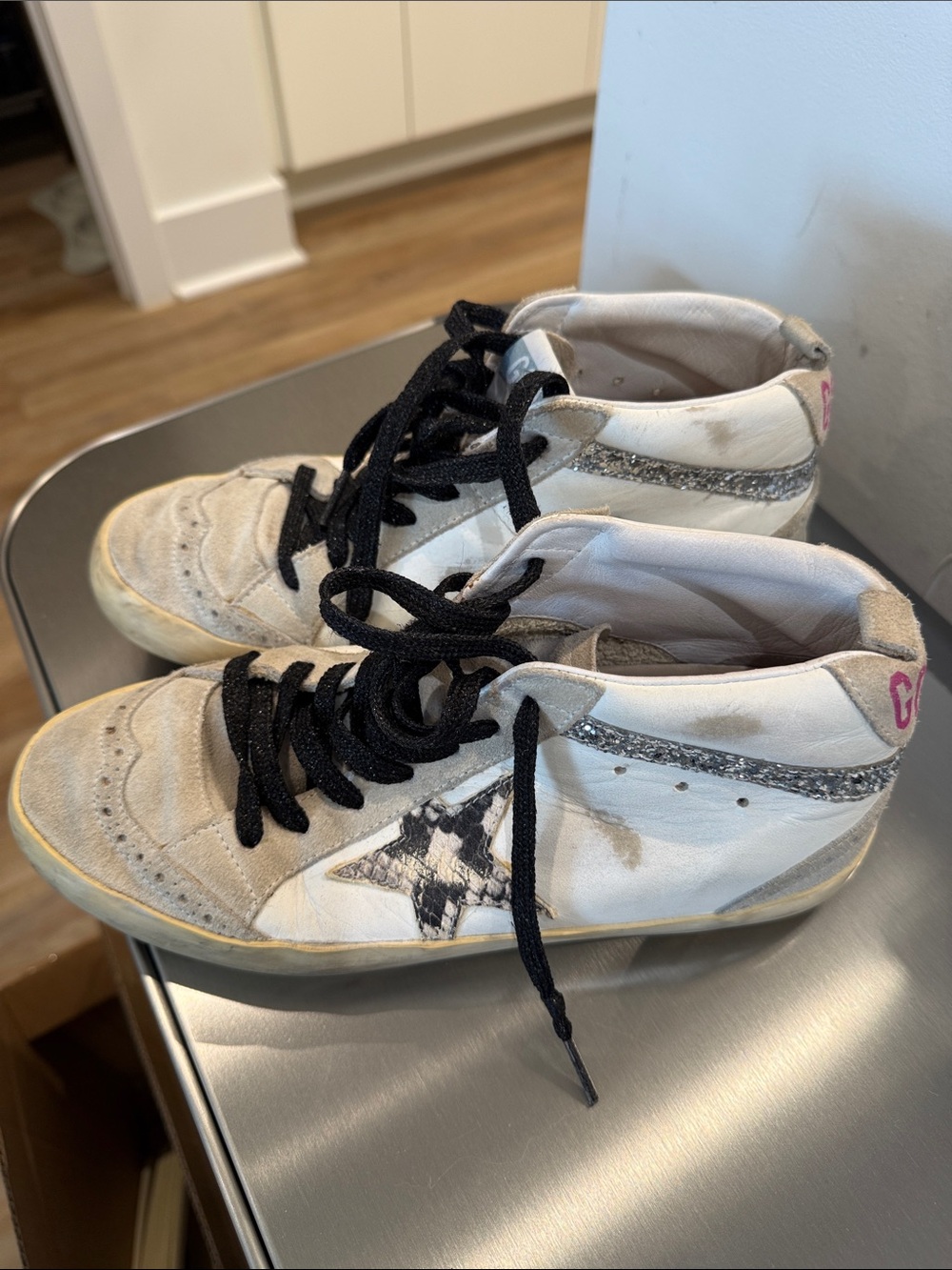 Golden Goose White High-Top Sneakers with Black Laces and Silver Glitter Accents